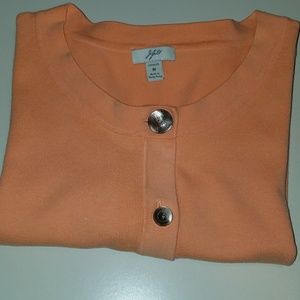 Tangerine colored medium-sized JJill sweater.